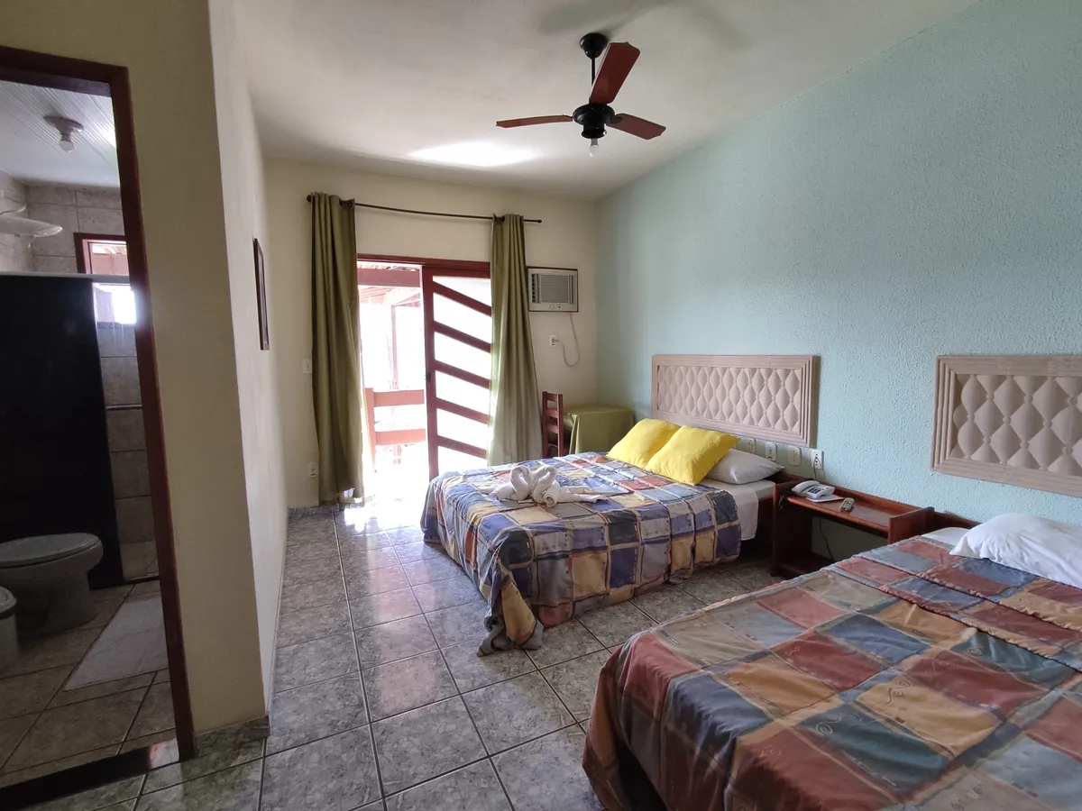 Apartamento com cama de solteiro e cama de casal
